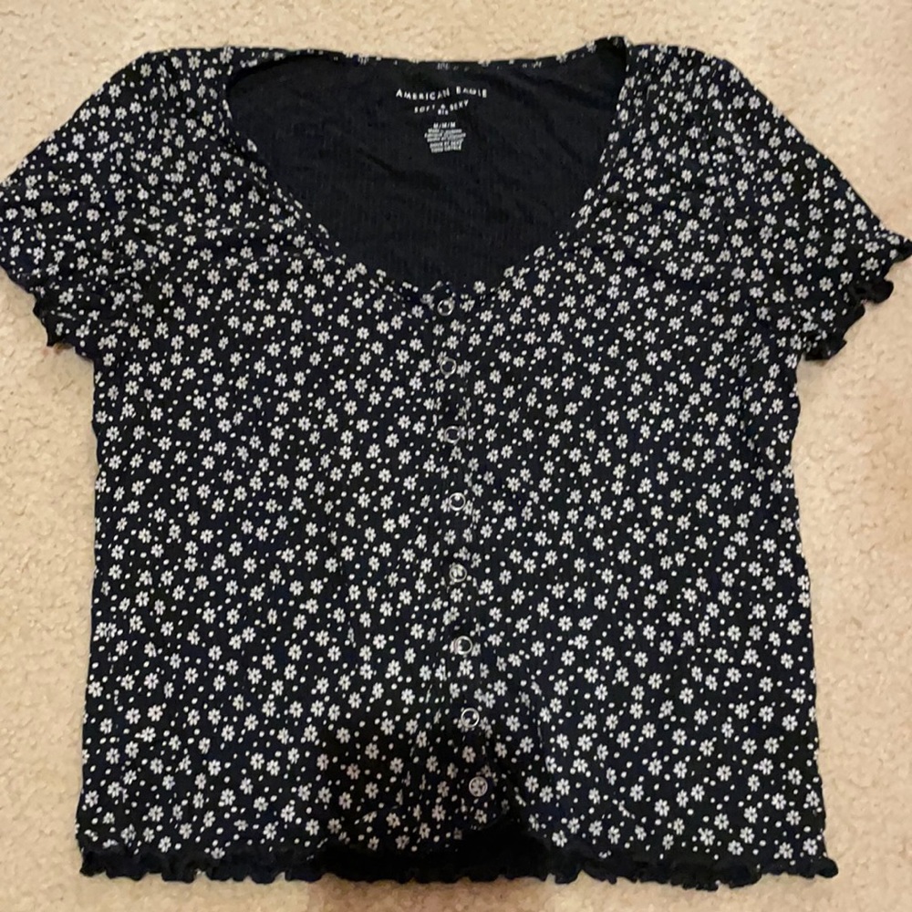 Black tshirt with white flowers